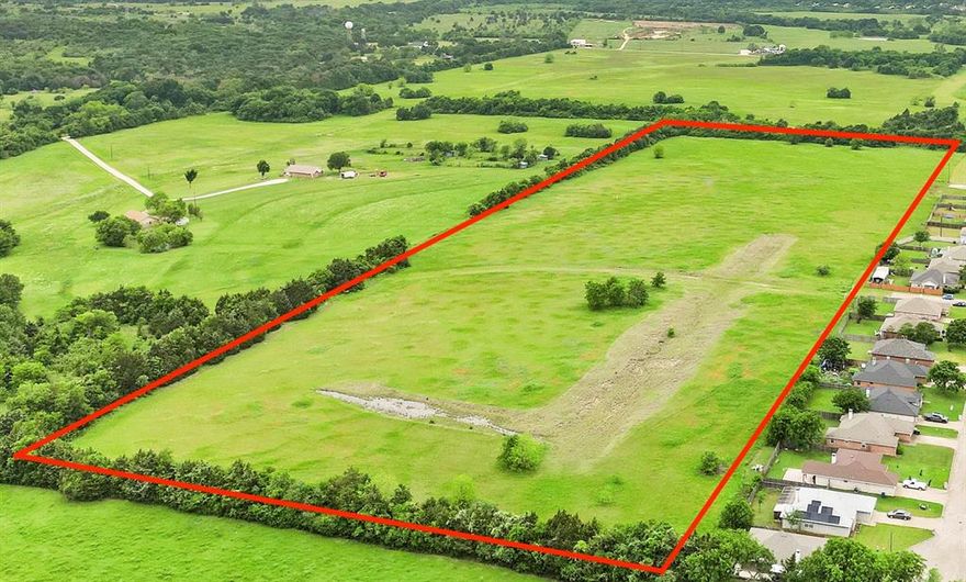 Prime opportunity in the highly sought-after Corsicana area—this 19.18-acre tract offers exceptional potential for residential development. Ideally located adjacent to established neighborhoods, the property combines convenience with a peaceful, scenic setting perfect for quality living spaces. Zoned residential and with utilities readily available, this parcel is well-positioned for single-family or community housing projects. Pipeline easements are already in place, supporting streamlined construction. Enjoy easy access to US-287, I-45, schools, shopping, and essential services. With ample space and strong growth in the area, this is an outstanding investment for developers or investors ready to create something special. Don't miss your chance to shape a thriving residential community in one of Navarro County’s most promising regions.