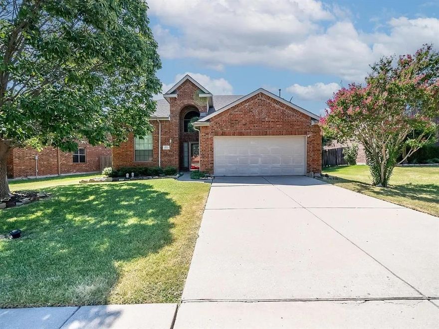 This lovely 4 bedroom 2.5 bath home in Prosper ISD is located perfectly in the middle of everything your family could need. TWO-STORY TALL ENTRY with tiled floor and walkway. The primary bathroom has a separate tub and shower, double sinks, and good under sink storage. Great split floor plan. Deep storage closet under stairs. Kitchen has Corian countertop, gas stove with griller & warming drawer, tiled floor & backsplash & under counter itg. Freezer space in utility. Gas log fireplace. Master bedroom suite has jetted tub, separated toilet room, shower & lg WIC with lots of shelves. Game Room up. C-fans throughout. 2 attic storage entrances upstairs. Covered patio & great landscape. Wood & iron fence. An additional Air-condition unit in the master bedroom. Enjoy a cozy evening by the fireplace. The backyard is fenced in and has a covered sitting area. Easily accessible to Hwy 75 and NDT. MUST SEE IT.