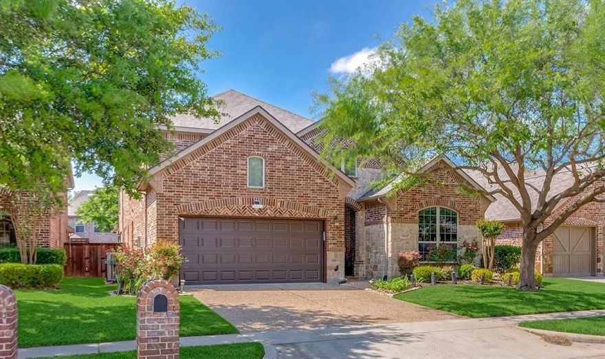 Welcome to this meticulously maintained 2-story home in McKinney, zoned to highly rated Frisco ISD, located in the sought-after Stonebridge Ranch community with access to exceptional amenities including Aquatic Center, Beach Club, community house, fishing, parks, playgrounds, pickleball courts, tennis courts, trails, lakes, ponds, and Stonebridge Plaza. Walking distance to parks, soccer fields, and Apex Centre. Upon entry, a private home office with French doors and front yard views sits to the right. The foyer and formal dining feature soaring ceilings, creating a bright, open feel. The family room offers a stunning stone fireplace, ceiling fan, and tall windows overlooking the covered patio and backyard. The kitchen is a standout feature—equipped with a gas cooktop and vent hood, granite countertops, abundant built-in cabinetry, and extensive counter space.  A large center island faces the living room with eat-in seating, ideal for entertaining. In addition, a second dining area sits by the breakfast nook, offering another eat-in space for everyday living.  Primary suite downstairs features dual vanities, soaking tub, and separate shower. Upstairs offers a large game room, media room, 3 oversized bedrooms, 2 full baths, and a versatile flex space ideal for a second office.  Fully fenced backyard provides privacy. Recent updates: water softener (2023), water filter (2024), dishwasher & oven (2023), carpet (2023), range hood (2023), toilets (2023), garage opener (2025), and updated windows in living, office and primary bathroom (2024). Convenient access to Hwy 121. Schedule your showing today!