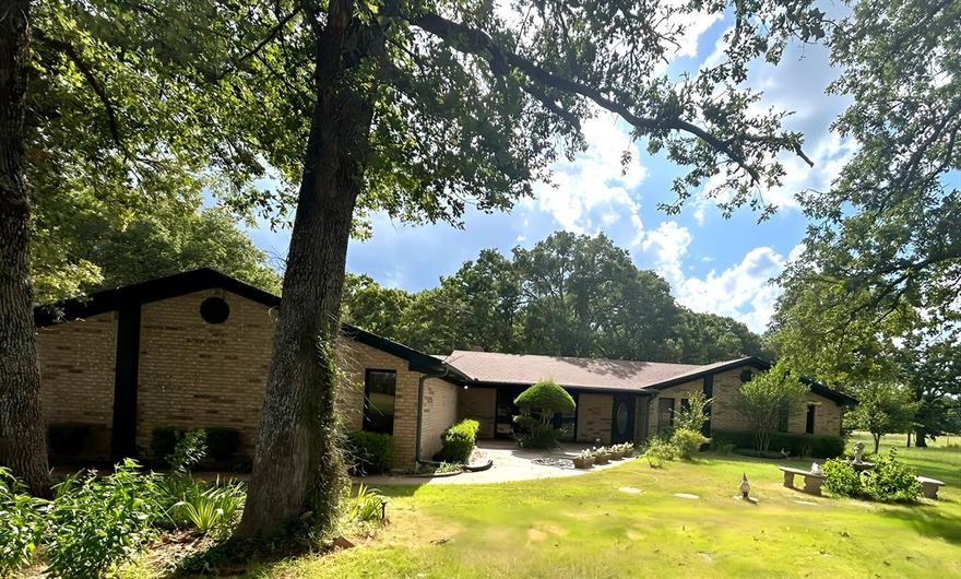 Discover your dream country home—a classic brick ranch nestled on approximately 14 acres, just minutes from Cedar Creek Lake. This lovely 2,200?sq?ft residence offers 3 bedrooms, 2 baths, and a bright, open floorplan perfect for family living. Imagine gatherings in the expansive living area, preparing meals at the generous kitchen with breakfast bar, and stepping into sweeping pastoral views with towering oaks and open fields.
Practical and charming, the property includes a spacious garage, a dedicated workshop, and a loafing shed equipped with its own HVAC—ideal for hobbies, storage, or even horses and livestock. Enjoy quiet country living with paved road access, yet remain close to water recreation, fishing, boating, and lakeside fun at Cedar Creek Lake, a beloved 32,000-acre destination just over 50 miles from Dallas