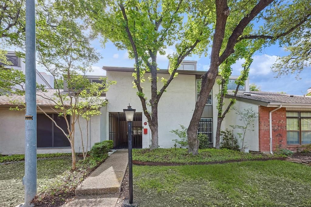 Photo of 9801 Smokefeather Lane, Dallas, TX 75243 (MLS # 21129272)