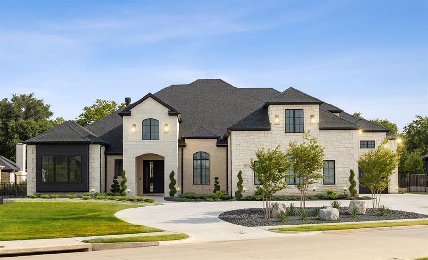 Welcome to your Dream Home! Luxury living in the prestigious Country Club Village, Argyle ISD. Once inside, you will be captivated by elegant white oak hardwood flooring (no carpet) and the soaring ceilings with stunning floor to ceiling fireplace and on-trend designer finishes & upgrades. This Carmen Custom Home boasts four Texas sized bdrms with attached baths & walk-in closets, study with built-ins, sizable media room, spacious laundry room with tons of storage, outdoor kitchen & primary suite that includes a spa-like bath and dreamy custom closet. The dreams continue in the Chef’s kitchen with a waterfall edge island & professional grade kitchen appliances; 72” Dacor Refrigerator, Monogram Induction Cooktop (Gas Plumb also) & Thermador Side by Side Ovens. If that wasn't enough, this incredible property features a 4 car garage with custom height garage doors & additional built-in cabinet storage, Generac Generator, Foam Encapsulation, Mosquito System & more! This home has it all!