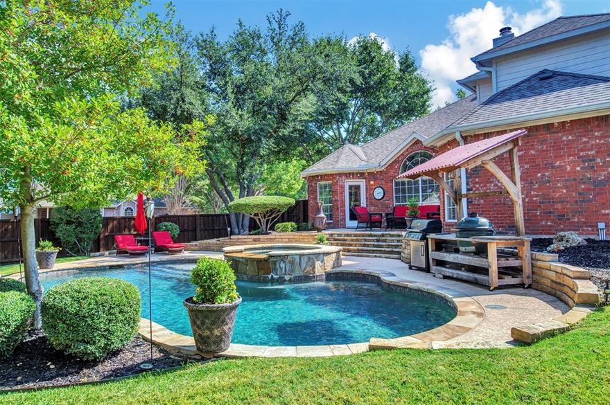 Gorgeous brick two story on a corner lot in the heart of McKinney framed by large mature RED OAK TREES! STUNNING POOL AND BACKYARD! Dramatic two story foyer, with formal Dining room and private office. GREAT FLOOR PLAN! Kitchen opens to Family room with wood floors. Kitchen features gas cook top, Bosch stainless appliances and SS refrigerator! Granite counters and BKFST bar. DEN features a WBFP with raised brick hearth! Lots of windows viewing pool. Large, primary bedroom has sitting area that views pool with tray ceilings and crown molding. Primary bath has a soaking tub, separate frameless shower, dual sinks and walk in closet. Upstairs has a 3 way split BDRM arrangement plus large GAMEROOM with an updated secondary bath! Laundry room offers shelving, perfect for organizing. Home has tons of natural light throughout. Amazing back yard with raised beds, beautiful stone patio with steps leading to the attached spa that cascades into the pool. The perfect place to cool off from that hot Texas sun.
