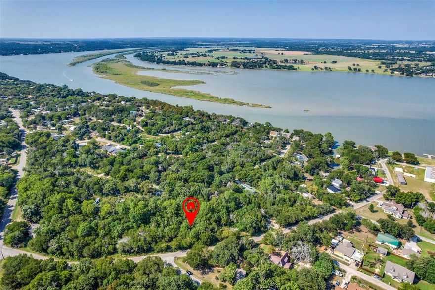SELLER FINANCING AVAILABLE • Rare Chance Near Lake Granbury

Affordable lots near Lake Granbury with seller financing are becoming harder to find, making this an opportunity smart buyers will want to notice. Just moments from the water, this 2,796 sq. ft. homesite offers the freedom to build now, hold for the future, or secure a valuable piece of land in one of North Texas’s most desirable lake communities.

Picture a charming cottage, a lock-and-leave weekend retreat, a low-maintenance retirement home, or an income-producing investment property in a location people love to visit year-round. Surrounded by mature trees and the natural beauty of the area, this lot offers the kind of setting that turns plans into reality.

Enjoy quick access to boating, fishing, paddleboarding, lakeside relaxation, and all the outdoor recreation that makes Granbury such a destination. Just minutes away, Granbury Square offers boutique shopping, local dining, live entertainment, and seasonal festivals that give the area its unmistakable charm.

Parks, walking trails, golf courses, grocery stores, healthcare, and everyday conveniences are all nearby, with easy access to Highway 377 for a smooth drive to Fort Worth and the greater DFW area.

Whether you’re looking for lifestyle, future value, or a simpler path to ownership, this lot checks the boxes. Opportunities like this do not stay overlooked forever. Secure your place near the lake and start building what’s next.