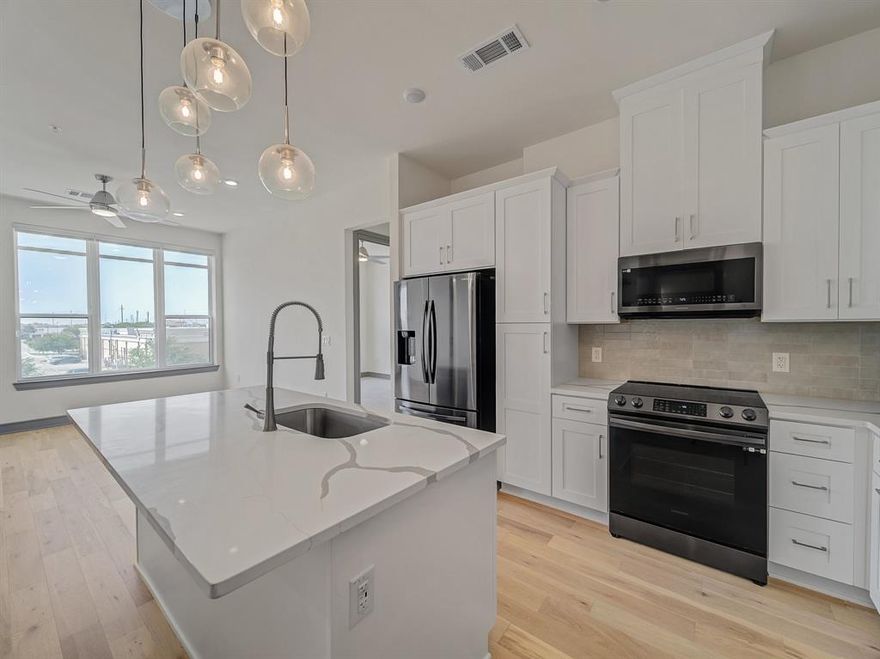 Discover this stunning 2-bedroom, 2-bath condo located on the first floor of a luxury community in Carrollton. Designed for modern comfort, this home features two spacious bedrooms with custom walk-in closets, an open-concept layout filled with natural light, and a sleek kitchen with a quartz island—perfect for casual dining and entertaining. Enjoy resort-style amenities including a yoga studio, fitness center, lounge, game room, swimming pool, bike storage, dog park, and scenic jogging trails. Conveniently situated near 121 and Old Denton Road, with easy access to I-35, George Bush Turnpike, and the Dallas North Tollway, this condo offers both style and convenience. Schedule a tour today and make this your new home!