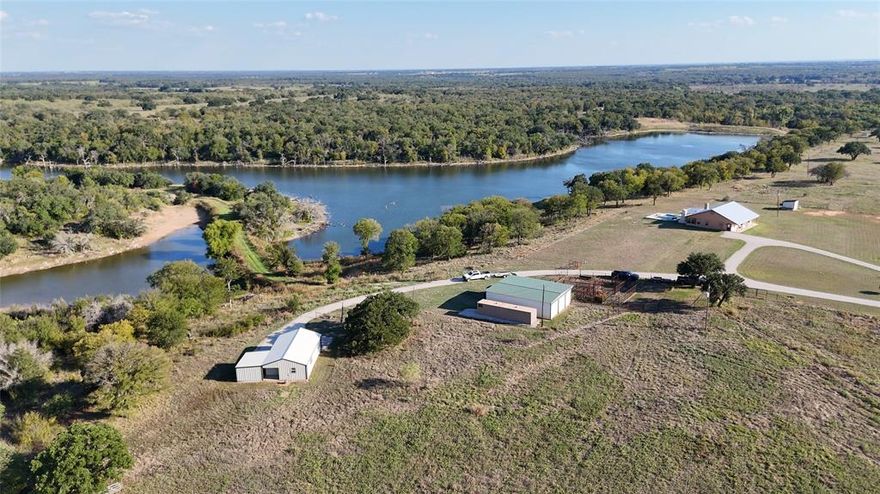 Grand Lago Ranch is the perfect choice for a buyer searching for a quality recreational ranch with some of the best fishing in central Texas. The focal point of the ranch is a 16.6ac lake professionally managed for over a decade by Texas Pro Lake Management. With the help of an engineering firm the storied lake was rebuilt in 2008. Planned structure, bottom up aeration, and annual fish surveys to determine harvest and stocking needs, all contribute to phenomanal bass fishing. Waterfowl hunting is also excellent in the shallows along the timber lined north end of the lake. For other wildlife pursuits the ranch spans 475ac with a combination of mixed brush, heavy in deer browse as well as over 100ac of tillable land for food plots. There are four other bodies of water on the ranch ranging from .25ac to 1.25ac contributing to excellent overall wildlife habitat. Access to the ranch is provided by paved FM Road 679 along the west boundary for access to the main three bedroom two bath rock home, two bedroom one bath guest barndominium, and equipment shed. On the east side of the ranch CR 479 provides access to a 3 bedroom 2 bath brick home that would be perfect for a ranch managers housing. The straight boundary lines, size, and habitat diversity make the Grand Lago a great candidate for high fencing and intensive wildlife management as well.