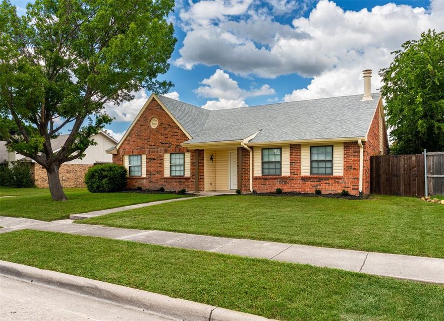 Beautifully Updated 3-Bedroom Home in The Colony – Fresh Renovations & Ideal Location! Welcome to 4500 Larner Street, a move-in-ready gem nestled in the heart of The Colony, proudly zoned to Lewisville ISD. This charming 3-bedroom, 2-bath home has been thoughtfully updated from top to bottom, offering fresh modern finishes while retaining its warmth and functionality. Step inside to discover a remodeled kitchen featuring elegant quartz countertops, white painted cabinetry, a stylish backsplash, new kitchen light fixture, and floating laminate floors that flow seamlessly throughout the home. Both bathrooms have also been beautifully renovated with painted cabinets, quartz countertops, and laminate flooring for a crisp, cohesive feel.
The open-concept living area is filled with natural light and anchored by a cozy corner brick fireplace—perfect for gathering with family or friends. A formal dining room and breakfast nook offer versatility for entertaining, while sliding glass doors lead to a covered patio, ideal for outdoor relaxation and diningEnjoy the convenience of being minutes from schools, shopping, dining, and Lake Lewisville. Whether you’re a first-time buyer, downsizing, or investing—this home checks all the boxes. New carpet installed 8-2024. One or more photos may be virtually staged.