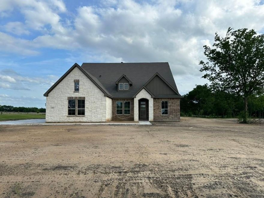 Estimated June 2026 completion! Ask about our Trade-In Trade-Up Program, we can buy your home when you buy ours! 1.02 acres! Step into the Bluebonnet by Riverside Homebuilders and embrace a lifestyle of comfort and functionality. With 4 bedrooms and 3 bathrooms sprawled over 2,686 square feet, this single-story haven offers ample space for every member of the family. As you enter through the inviting porch, the airy foyer sets the tone for the home's open layout. To the left, a flex room awaits, beckoning to be transformed into your ideal space—whether you envision a home office, gym or hobby room. Continue through the foyer to discover the heart of the home—a luminous dining room bathed in natural light. Beyond lies the main living area, a seamless fusion of the expansive kitchen, cozy family room featuring a fireplace and a charming nook adorned with picturesque windows. On the right wing of the home, privacy awaits with three traditional bedrooms and a breathtaking owner's suite. The owner's retreat boasts a spacious walk-in closet and a spa-like bathroom, offering a sanctuary for relaxation. Convenience is paramount with the laundry situated just off the bedrooms, accompanied by a mud bench near the garage entrance. To embrace the beautiful DFW weather without having to leave your home, step outside to the generous covered patio—where endless possibilities for outdoor enjoyment await. With its thoughtful design and inviting atmosphere, the Bluebonnet embodies the epitome of charming Texas living for all families alike.