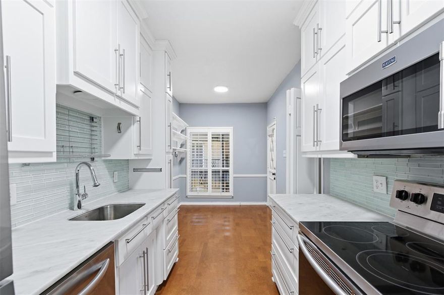 Welcome home to this beautifully maintained 2 bedroom, 2 bath condominium, featuring one of the largest floor plans in the community! This inviting home offers a thoughtfully designed layout with generous living spaces and loads of storage throughout. Enjoy the bright, airy feel enhanced by plantation shutters and a large bonus or flex room; perfect for a home office, playroom, or guest area. The full-size washer and dryer are conveniently included in the sale. Step outside and enjoy the unbeatable location directly across the street from Tanglewood Elementary, with quick access to shopping, dining, and major commuter routes. The unit includes one covered carport, plus additional convenient parking and easy access to the condominium. Don’t miss your chance to own one of the most desirable floor plans in the complex!