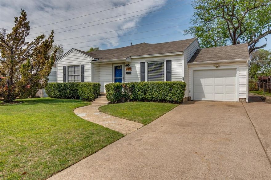 Nestled in one of East Dallas's most sought-after pockets, this beautifully updated ranch-style home delivers the perfect blend of character and modern comfort. Rich hardwood floors flow throughout an open-concept layout where the main living area transitions effortlessly into the updated kitchen and a second living space — ideal for entertaining or relaxed everyday living.
The kitchen has been thoughtfully refreshed with updated cabinetry and finishes that balance style with function. Three well-appointed bedrooms and two full bathrooms round out a floor plan designed for easy living. And with plumbing, electrical, roof, and gutters all replaced in 2020, the big-ticket items are already done — so you can move in with confidence and focus on making it your own.
Step outside the neighborhood and you're minutes from the scenic trails of White Rock Lake, the world-class Dallas Arboretum, and a vibrant lineup of highly rated local dining — all the best of East Dallas, right at your doorstep.
This one checks every box. Come see it before it's gone.