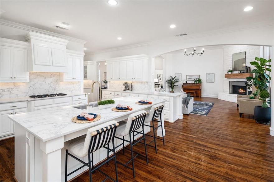 Parker 1 acre estate property, SINGLE STORY custom Paul Taylor home with light-filled living spaces, designed for both everyday living & effortless entertaining. The stunning and exceptionally designed kitchen featuring Bosh appliances, quartz countertops, double ovens, and an amazing amount of cabinetry & walk-in pantry. The primary suite is a true retreat that is private and spacious with wood flooring and large bay window seating area, the luxurious bath is complete with dual vanities, soaking tub, walk-in shower, and two sep large closets. The game room is spacious, a wall of windows & plumbed for wet bar; the Media room has no windows so it's ideal for movie nights and is wired for a sound system. This 1 acre estate  offers endless outdoor possibilities - relax by the firepit, enjoy growing fresh veggies & herbs in the dedicated garden area with raised beds & watering system.  Whether you're a car enthusiast, have an RV or just looking for extra storage, you will appreciate the oversized 3+ car garage with epoxy floors, built-in cabinetry and workshop - With a 14ft ceiling, & a bay with RV height door, it's ideal for oversize truck, trailer, RV or for even a car lift.  This home is move-in ready: Updated Kitchen +Roof replaced 2025, HVAC systems replaced 2022 & 2023, Hot Water tanks replaced 2021, kitchen appliances replaced 2024.