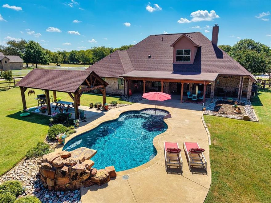 Very Motivating New Price! VALUE LISTED! Country Luxury with City Convenience in Joshua ISD Welcome to 3400 Bent Creek Trail, Crowley, TX—a stunning 2,900 sq. ft. home that perfectly balances country charm with upscale living, all located in the highly sought-after Joshua ISD. Just 15 minutes south of Downtown Fort Worth, with easy access via the Chisholm Trail Parkway at FM 920 and FM 1902, this residence offers convenience without sacrificing tranquility. Designed with mostly one-story living in mind, the thoughtful floor plan features 3 bedrooms, 2 full baths, and 2 half baths. Upstairs, a versatile game room with its own half bath and walk-in closet provides endless possibilities for recreation or private retreat. Inside, you’ll find wood floors, soaring tray ceilings, and a striking stone fireplace anchoring the main living area. The home also includes a formal dining room, breakfast nook, dedicated office, spacious laundry room, and a 3-car garage. The primary suite is a spa-inspired retreat, featuring a deep soaking tub, separate shower, dual vanities, and a large walk-in closet—designed for both indulgence and functionality. Step outside to your personal resort. A sweeping covered patio runs gracefully across the back of the home, offering generous space for dining, lounging, and entertaining. Beyond lies a sparkling in-ground pool with tanning deck, framed by professional landscaping, and a poolside cabana. The expansive backyard is fully fenced and level, creating the ultimate setting for gatherings or peaceful evenings at home. This is more than a home—it’s a lifestyle, offering country elegance, modern amenities, and top-rated Joshua ISD.