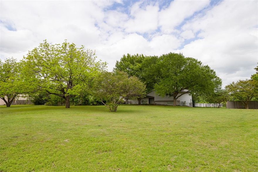Well shaped 7 ACRE PROPERTY in the HEART OF PLANO, TEXAS. Located 60 seconds from the intersection of Legacy Drive and Avenue K (SH 5) with Central Expressway (US 75) 90 seconds away, this hidden gem offers flexibility like no other. Drive through a secluded neighborhood of classic homes on large tree-covered lots to Exceptional Potential in an increasingly hard-to-find setting. Split-level home is set beneath a canopy of huge mature trees and offers 5 bedrooms, 2 full baths, and 2 half baths. Adding to the allure is a large walk-out basement that is flooded with natural light with easy access through two sets of french doors to the outdoors. Recently updated cozy kitchen is efficiently designed with a breakfast bar, concrete countertops, and Samsung stainless steel appliances, including fridge. Living room's wall of windows starts and ends every day with calm as you overlook the pasture and down to the timber-covered creek. Enjoy coffee on the rear deck under the majestic shade trees. This is an opportunity to create something truly special while comfortably living in the home during the process. Outdoors, the property continues to impress with two large workshops with electricity and rollup doors for all of your parking, storage, and creative needs. No HOA. Zone SFR and surrounded by mature trees with Rowlett Creek as the eastern boundary, the property offers a rare combination of natural beauty and usable space in a sought-after location. All information is deemed to be reliable. Buyer and buyer's agent to perform due diligence on all levels, inc. but not limited to, zoning, future uses, easements, measurements, square footages, taxes of any kind, property restrictions, schools, etc.