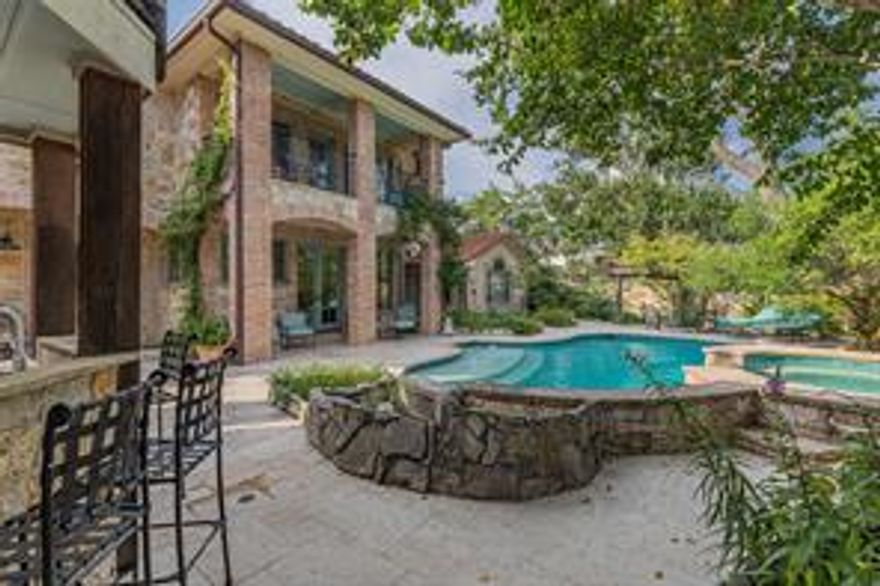 Magical Mediterranean: Lush Gardens, Arches, Sculptures, Resort Backyard, Pool, Spa, Fountain, Pergola, Covered Kitchen,Bar,Firepit,Balconies,2 Bd Guest House,3+ Garage. 5 Bd each w Large Ba(2 Primaries 1-Up,1-Dn) Roman Guest Ba, Dining, Great Room & Wet Bar Opens to 25'x13' Chef Kitchen, Enormous Center Island,  Top-Line Appliances, Separate Baker's Cupboard, Walk-In Pantry, Game Room, Media with Wet Bar,2-Story Artist Studio, Walk-In Mechanicals. Carved Doors, Venetian Plaster,Mosaics,Murals,4 Fireplaces. Please see uploaded Appraisal. Plan,Survey,T47,SD,LBP,Amenities-MLS. Buyer and or Buyer agent verify sq. ft.