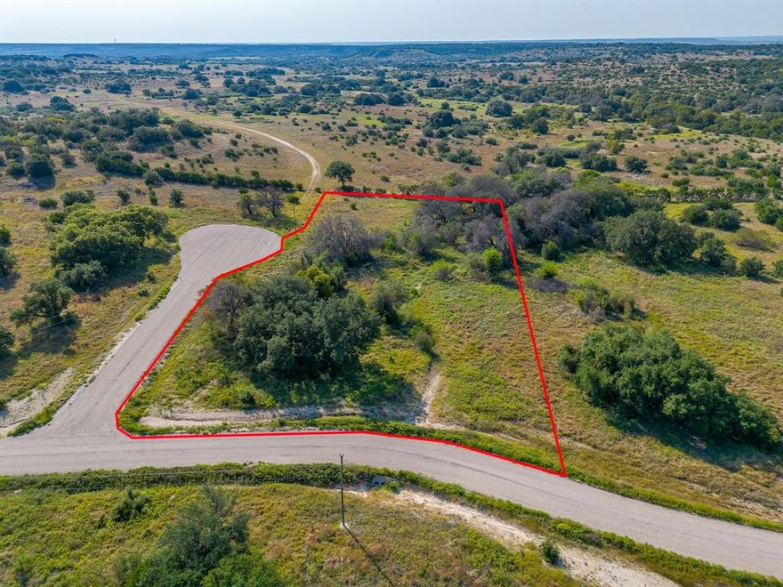 Come enjoy country living in this unique subdivision offering scenic views and plenty of wildlife. This great 2.58 acre corner lot in a cul-de-sac is a prime place to build. This community is gated, features scattered trees and community mailboxes. Residents will enjoy proximity to such attractions as Dinosaur Valley State Park, Fossil Rim Wildlife Center as well as nearby city conveniences. The community is slated to include several more amenities including walking trails and a fishing pond. While offering a quiet country setting it is close to Gen Rose and an hour's drive to Fort Worth. Come see this exceptional lot to build your dream home!