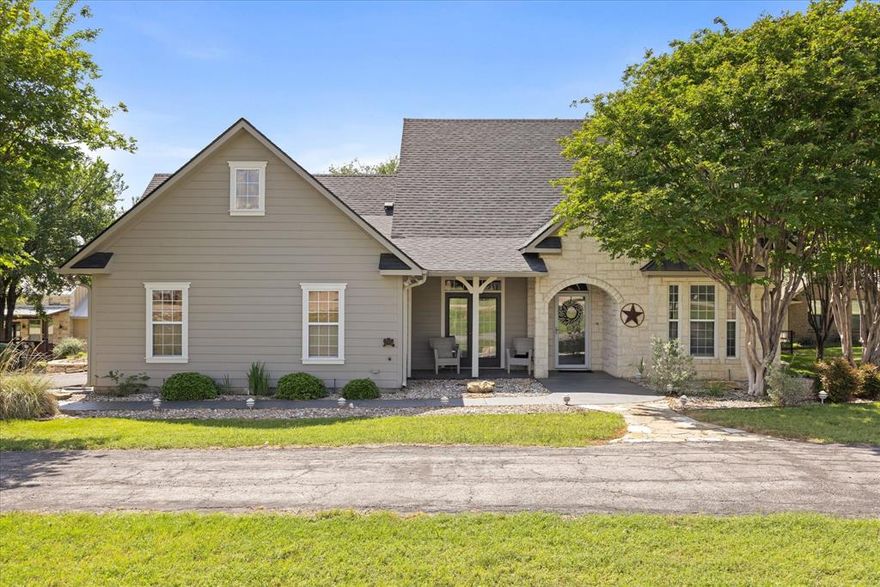 Located in the desirable Bentwater community of Granbury, TX, this charming 2,500 sq ft home is situated on a 1-acre lot shaded by mature oak trees, offering privacy and a peaceful setting. The property features multiple covered porches, providing ample outdoor space for relaxing or entertaining.

The home offers a functional floor plan with spacious living areas, well-appointed kitchen, and comfortable bedrooms. Interior features include abundant natural light, generous storage, and practical design elements suited for everyday living.

A detached garage apartment provides additional living space, ideal for guests, extended family, or a variety of other uses. This separate structure adds flexibility and value to the property.

Property includes a deeded boat slip, allowing for direct access to the lake.  

Sellers are highly motivated and ready to review offers giving you a compelling buying opportunity in today’s market. Buyer to verify all information including square footage, lot size, schools, and restrictions.