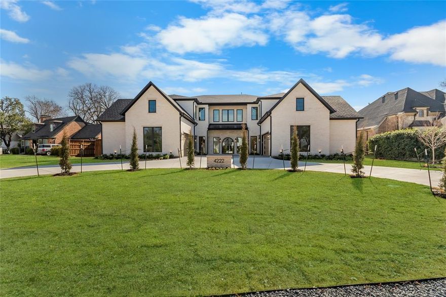 Captivating new construction in the heart of Dallas built by Laszlo K Homes. Situated on an oversized half acre lot, this home embodies a redefined expression for a timeless transitional home met with exquisite architecture. With a thoughtful layout embodied with luxury finishes and beautifully executed craftsmanship, well balanced proportions create an unmatched living environment that feel warm and inviting. Upon entry, you're greeted by soaring  24 ft ceilings and a striking custom wrought-iron spiral staircase. The first level encompasses a dramatic arched walk through, European White Oak flooring, and a sophisticated wet bar and temperature controlled wine storage for those who enjoy entertaining. Continue on to an inspiring oversized family room , accompanied by a elegant chef's kitchen with custom white oak cabinetry, 11 ft island, commercial  grade Subzero, Wolf appliances, quartz countertops and convenient prep kitchen and pantry. The master suite is a tranquil retreat that includes elegant lighting fixtures, oversized shower, dual vanities, coffee bar station, and his and hers closets that will impress the most discerning Buyers. Additional first floor features include a generous sized laundry room, multiple mud room areas, large storage room, a captivating office and that extra first floor guest bedroom. Upstairs surely does not disappoint  with three additional generous sized bedrooms with on suite baths, game room, wet bar, and a media room for movie night, two half baths and an expansive bonus room perfect for a home gym or additional game room. Walk outside and you will see a seamless connection between indoor and outdoor living, an extensive backyard with dual covered living areas, gas fireplace, outdoor kitchen and plenty of room for that future outdoor pool oasis retreat. Rounding off this masterful creation you get a  circle driveway that allows ample parking, four car garages allowing additional car storage for those car enthusiasts.