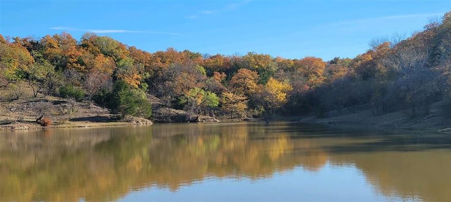 INCREDIBLE land! Keep all 73 acres where you can't see another rooftop and build a secluded mansion or divide up into several tracts just 15 minutes east of Downtown FW, 10 minutes from AT&T Stadium, 25 minutes from DFW Airport and Downtown Dallas!!!! 3000 feet of frontage ON the West Fork Trinity River!  Land has never been on the market. Three Ponds. Ingress from Jency ($3m+ homes) to east and Lowery to west. Potential for driveway onto property from Waterchase Circle ($750K+ homes).  20 heads of cattle and farm equipment can convey with sale.  

About 38% of property is in the Flood Plain only the north side of the property.  Property is virtually all Ag and will have to be replatted to add any buildings to the property.

Seller is a licensed real estate agent.