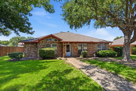 Photo of 329 Pepperwood Street, Coppell, TX 75019 (MLS # 21340470)