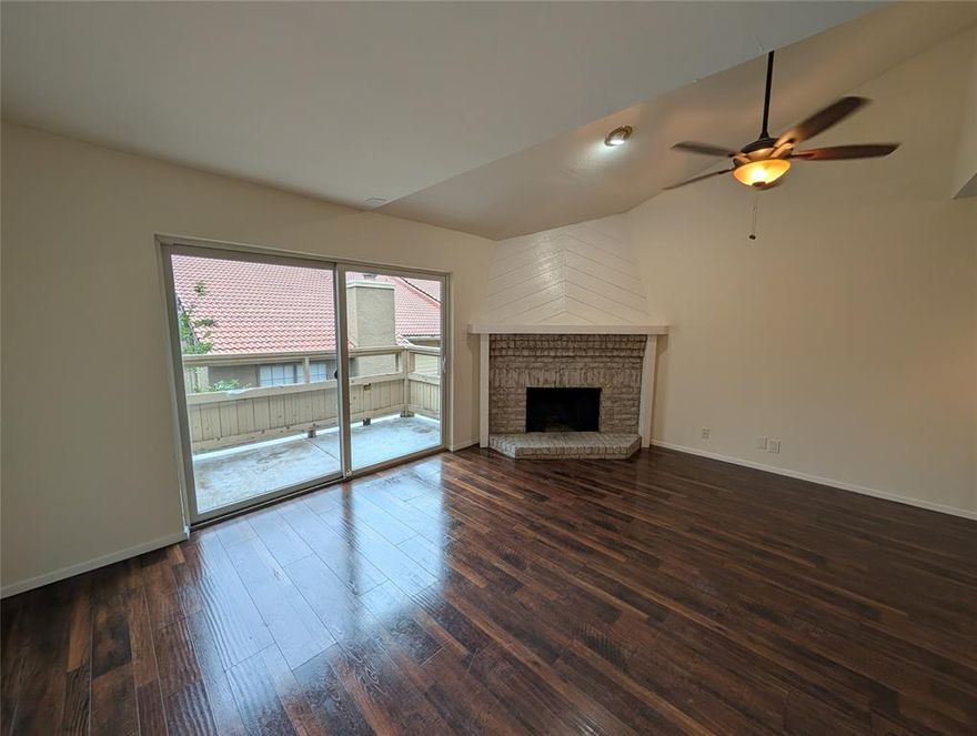 Tasteful two story condo near Glencoe Park!  Centrally located with easy access to Katy Trail, SMU, Mockingbird Station, and Lakewood!  Large living and dining area with laminate wood floors and fireplace.  Beautiful balcony with sliding storm door.  Updated kitchen includes granite counters, brand new appliances, and full size laundry area.   Half bath under the stairs.  Loft style bedroom upstairs with brand new carpet, en suite bath, and walk in closet.