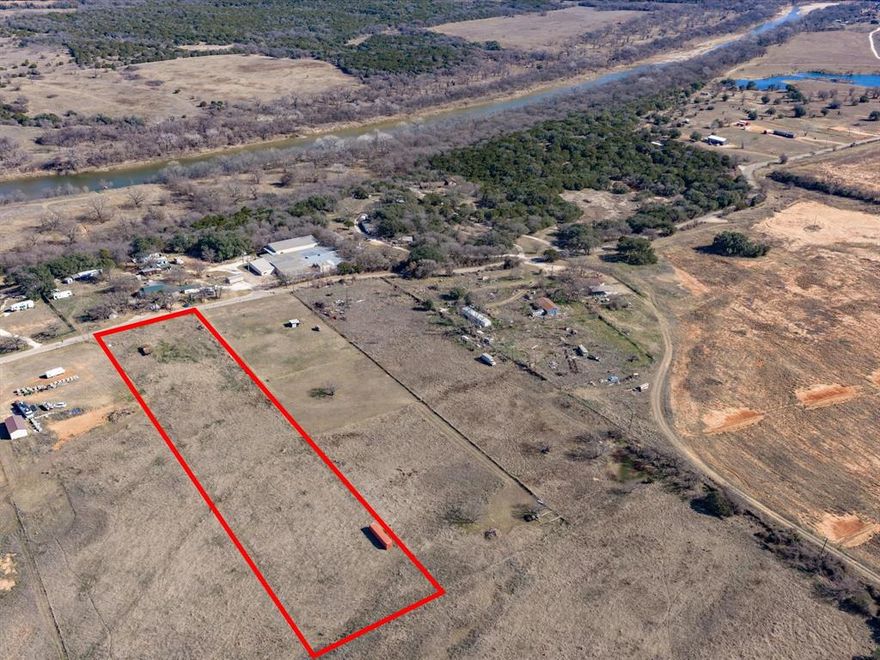 Just over three acres of peaceful Texas land located near the Brazos River, ideal for a homesite, weekend getaway, or investment. The property includes a shipping container that will convey with the sale, offering easy on site storage or can be converted into a container home. This mostly flat piece of land offers the ability to build and leave plenty of extra space.