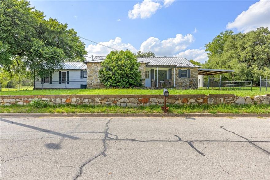 Beautiful well established home in the heart of Glen Rose. Close to schools, dining, and grocery stores. Large family room, wood burning stove, and just over an acre of land. The large shop for storage or projects. The 5 bedrooms gives you room to spread out and have your own space. A must see!! New paint throughout.  New flooring.  Ready to rent.