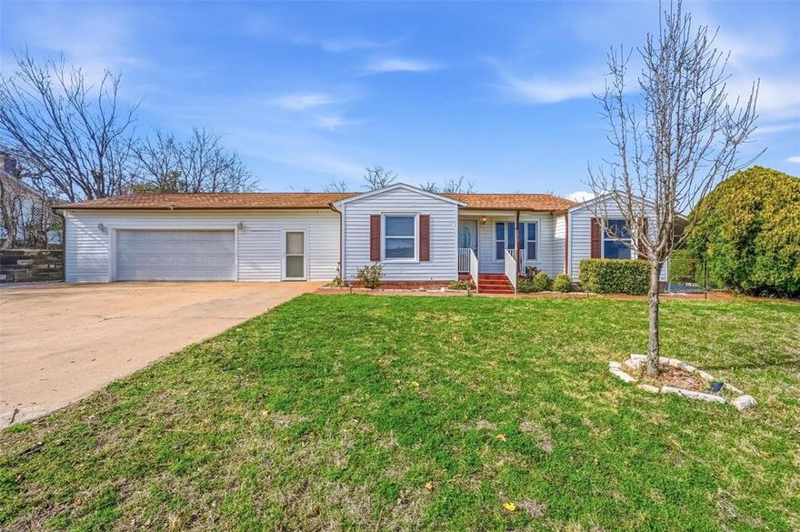 Updated 3 bedroom,2 bath single-story home with a versatile bonus room that can function as a 4th bedroom, office or family room.Two spacious living areas include a welcoming front living room and a separate living space with a modern fireplace accent wall.

Well designed kitchen provides extended granite countertops, subway tile backsplash, abundant white cabinetry, and open pass-through to the living area. Designed for both everyday efficiency and effortless entertaining.

Step outside to a large backyard with covered patio and extended concrete area -perfect for weekend barbecues, outdoor gatherings, or simply relaxing after a long day. The large lawn offers plenty of room for pets, play, or creating your own dream outdoor space.