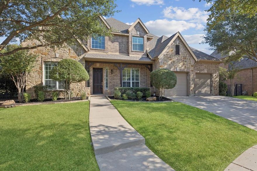 NESTLED IN THE COVETED COMMUNITY OF THE BLUFFS! NO PID! HUGE .4 ACRE LOT! WELL MAINTAINED AND MOVE IN READY! Absolutely stunning 4-bedroom, 3.5-bath home with a 3-car tandem garage, set on a spacious .4-acre lot in the highly sought-after The Bluff at Heritage community! Step inside to be greeted by soaring 2-story ceilings, rich wood flooring, elegant crown molding, recessed lighting, arched doorways, and plantation shutters throughout. The open-concept design showcases a dramatic floor-to-ceiling stone fireplace in the living room with views of the upstairs catwalk, plus built-in surround sound speakers for an immersive experience. The chef’s kitchen is a true showpiece with abundant cabinetry, granite countertops, stainless steel GE appliances including double ovens, a center island, and a walk-in pantry.

The luxurious primary suite features an elegant tray ceiling with intricate molding and an ensuite bath boasting dual quartz vanities, a jetted tub, and a massive walk-in closet with a unique under-stair storage nook. The main level is completed with a designated office, formal dining room, and a secondary bedroom. Upstairs, the wrought iron spindle staircase leads to a spacious loft, 2 additional bedrooms connected by a Jack-and-Jill bath, and a huge game room perfect for entertaining.

Outdoors, enjoy a covered front porch, a back patio, a large concrete pad ideal as a basketball court, and even a tetherball pole—all within the privacy of wood and wrought iron fencing.

Residents of Heritage enjoy incredible HOA amenities including multiple resort-style pools, a waterpark, tennis courts, walking trails, playgrounds, fishing ponds, clubhouse, fitness center, and planned community events. This home offers the perfect blend of luxury, function, and fun in one of Fort Worth’s most desirable neighborhoods!