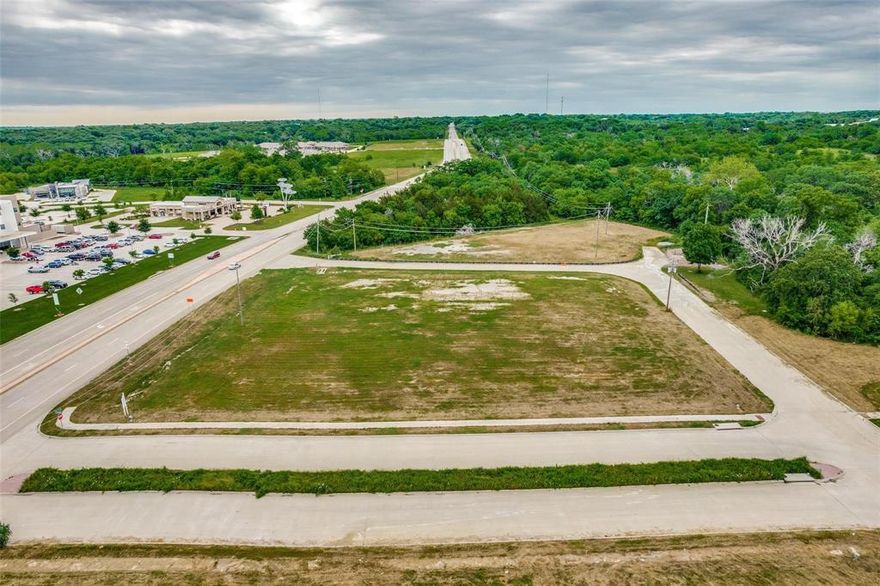 Property is located less than a quarter of a mile off of 1-75 in Sherman, TX at the corner of FM 691 and Swamy Drive. Situated between I75 and Texoma Pkwy, this property is perfect for your Mixed Use, Retail or Commerical development. It is also due south of the Texoma Medical Center and less than 12 miles to Texas Instruments and GlobiTech. This is an ideal location for a development or future investment opportunity. Perfect for a 90 Room hotel, 20,000 sf medical plaza or senior living center. Can be divided into two 1.2-acre pad sites. Also available for land lease.