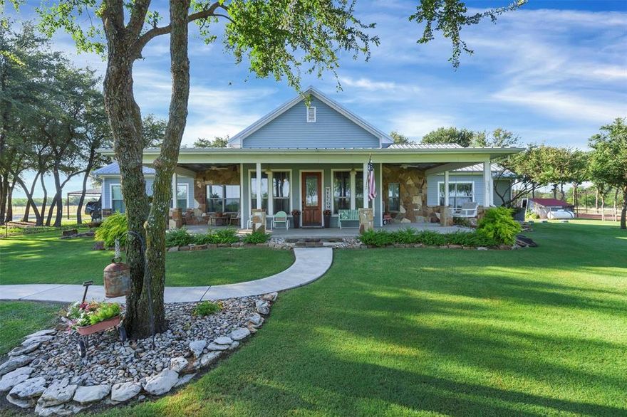Unparalleled Ranch Life is here! This 20-acre ranch has the most charming craftsman style farm home in Texas. The residence includes 4 beds, 3 baths, and a versatile office space. Each room offers stunning views, especially from the kitchen, where a vast island, ample cabinets, and extensive counter space make cooking a pleasure. High-end appliances include a gas cooktop and double oven, while unique antique fixtures, barn wood interiors, a double drainboard sink, and an extremely rare L. Wolff American Standard clawfoot tub adds untouched character. Outdoors, experience the pool life, perfect for summer days. The property hosts a large show barn, equipped with electrical wiring, a controlled mister system, and plumbing. Other amenities include cross-fencing, landscape lighting, a lush sodded yard, and a baseball field with a 75-foot batting cage. Live amidst the neighboring high fenced land filled with exotic animals. A true craftsman masterpiece where elegance meets functionality.