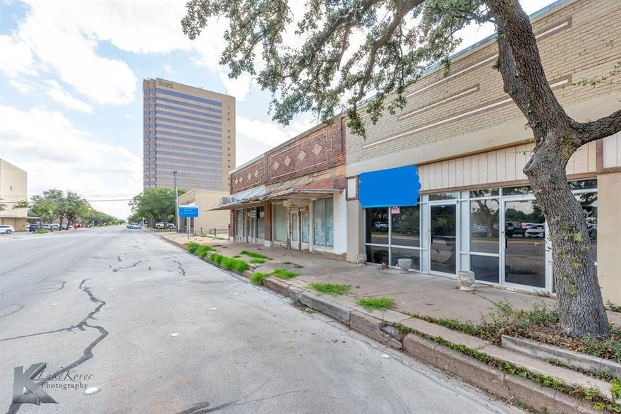 Owner Agent. 3000 square feet of Office space next to the Taylor County Courthouse. 342 Chestnut is completed with 8 private offices, multiple reception areas, full living room or break room, fireplace, kitchen, full bathroom and more! This property has brand new plumbing, lighting, office doors, granite countertops, new flooring (carpet and LVP). This property also boasts 400 amps of electricity, making endless possibilities for any of your commercial needs. The back room has plenty of file storage with built in bookcases. Do not worry about parking because there are plenty of spots in front and the courthouse is across the street for any overflow parking needs.