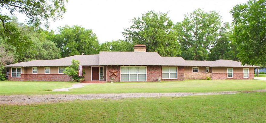 Welcome to your private slice of country paradise! Nestled on just over 2 beautiful acres, this stunning 5 bedroom, 3 bath ranch style home offers the perfect blend of space, comfort, and timeless charm. From the moment you arrive, the picturesque curb appeal and sprawling grounds set the tone for everything this exceptional property has to offer. Inside, you’ll find expansive light-filled living and dining spaces designed for both everyday comfort and effortless entertaining, anchored by a warm and inviting wood-burning fireplace. A flexible bonus room provides endless possibilities for a game room, home office, media room, or second living area. The spacious primary suite features a private ensuite bath and updated built-in wall AC unit, while the second bedroom also offers its own full bath ideal for guests or multigenerational living. Outdoors, enjoy wideopen space, generous concrete parking, mature shade trees, and 17 producing pecan trees that add beauty and value to the property. With recent HVAC updates, propane heating, and room to live, grow, and entertain, this one of a kind property delivers the peaceful lifestyle and versatility buyers dream of. Motivated seller bring your offers! Pool table negotiable with the sell of the property.
