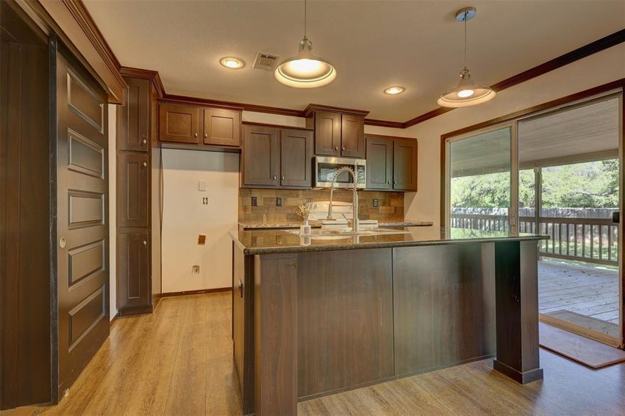 This home has never been moved and qualifies for FHA & VA financing. 
Charming 3-bedroom, 2-bath home situated on a spacious half-acre lot just 3 miles from Lake Whitney! This property features a desirable split floor plan offering privacy and functionality.

The primary suite is a true retreat with a spa-like en suite, complete with a walk-in shower, garden tub, and dual vanities. The open layout provides comfortable living with plenty of space to relax or entertain.

Recent updates within the last year include paint, new carpet, skirting, stove, microwave, living room window shades, and a carport.

Step outside to enjoy the large covered back deck, perfect for morning coffee or evening gatherings. The backyard also includes an 11x6 storage shed built by Leland’s, offering additional space for tools or hobbies.

Enjoy the peaceful setting with room to spread out, all while being just minutes from lake access, fishing, and outdoor recreation.