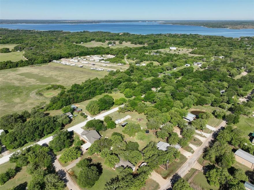 This home has never been moved and qualifies for FHA & VA financing. 
Charming 3-bedroom, 2-bath home situated on a spacious half-acre lot just 3 miles from Lake Whitney! This property features a desirable split floor plan offering privacy and functionality.

The primary suite is a true retreat with a spa-like en suite, complete with a walk-in shower, garden tub, and dual vanities. The open layout provides comfortable living with plenty of space to relax or entertain.

Recent updates within the last year include paint, new carpet, skirting, stove, microwave, living room window shades, and a carport.

Step outside to enjoy the large covered back deck, perfect for morning coffee or evening gatherings. The backyard also includes an 11x6 storage shed built by Leland’s, offering additional space for tools or hobbies.

Enjoy the peaceful setting with room to spread out, all while being just minutes from lake access, fishing, and outdoor recreation.
