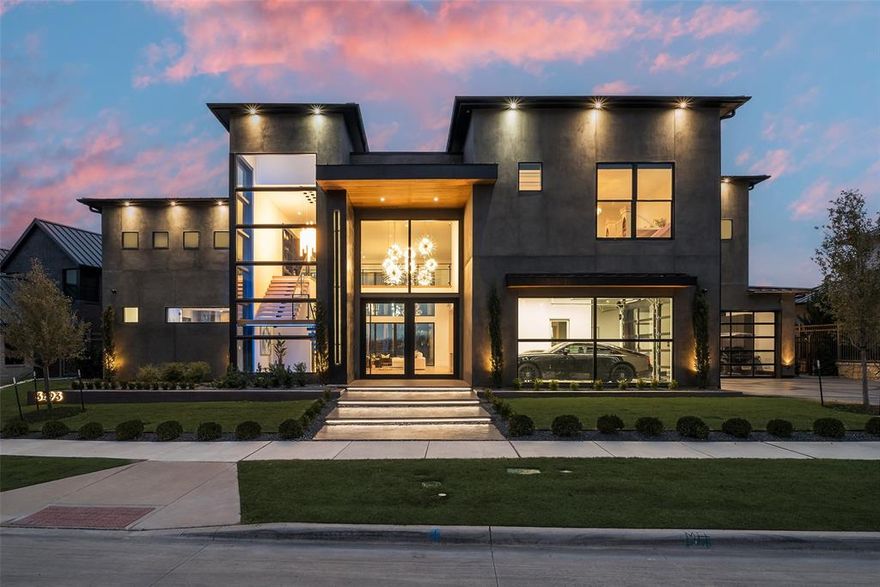 Welcome to the pinnacle of luxury living, nestled in the prestigious Hills of Kingswood. This custom-designed home boasts an extraordinary blend of soft, moody finishes and high-end craftsmanship. Experience museum-quality walls adorned with breathtaking light fixtures, and indulge in unique features like a jaw-dropping 4-car garage that opens to the foyer, a home theater complete with a bar, and dual chef's kitchens outfitted with top-of-the-line appliances. Multiple outdoor living spaces make this residence an entertainer's dream. The home also includes a water filtration system and a generator system capable of powering the entire property. Enjoy peace of mind with 24 hour guarded entry and ultimate privacy. Located just minutes from The Star, the Dallas Cowboys headquarters, Legacy West, and Fields West for premier shopping and entertainment, with Universal Studios nearby. This home is truly one-of-a-kind.