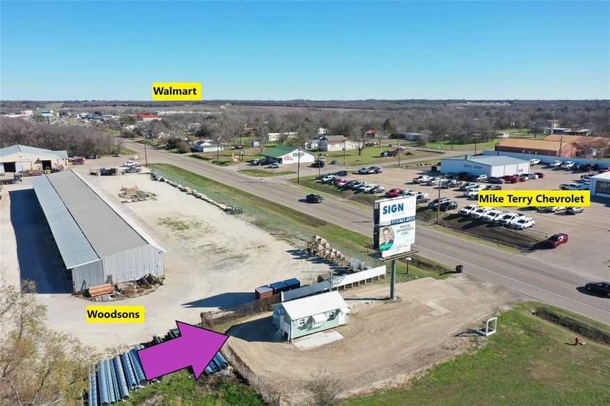 AFFORDABLE LOT on High Traffic Hwy 84 in Mexia!  You’re sure to be noticed at this location between Woodson’s & Tractor Supply with Mike Terry Chevrolet across the street.  Very versatile! Great for small business, office, food truck, beauty shop & the list goes on.   Per seller, the billboard generates 108 monthly revenue.  Nice bonus!  Lot measures approximately 62.5 frontage on US HWY 84 & 90.6 depth.  There is also a septic tank in place.  Please see disclosure  The location has no comparison!  AND with TxDot future construction of a turning lane & sidewalk, it will be even better!  The building is not included.