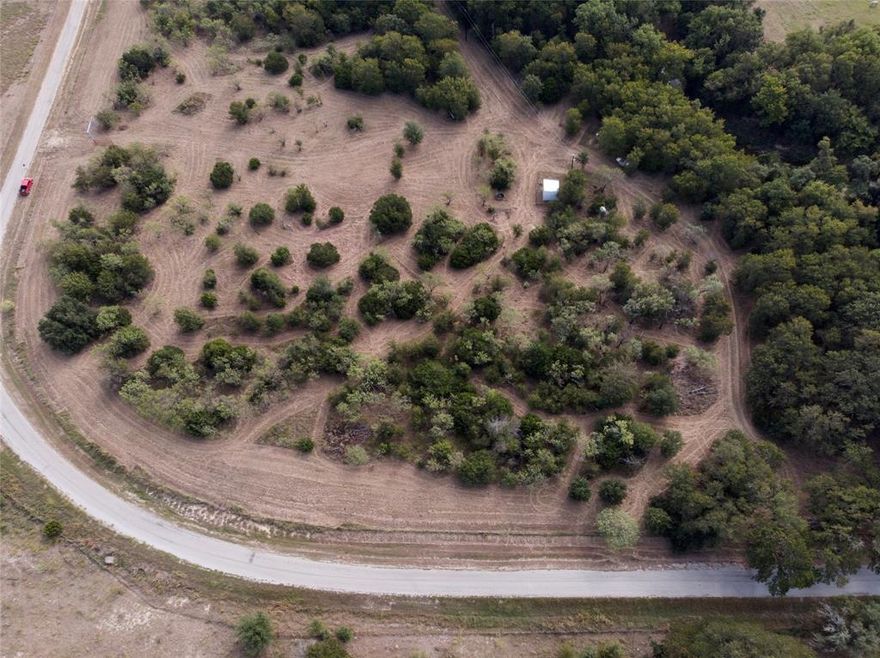 Property Highlights
• Total Acreage: 18.9 acres located in the desirable Steed Addition
• Lot Options: Seller is wanting to sell as a whole. Will consider selling the four platted lots individually. Each lot is approximately 4.5+ acres each.
• Topography & Setting: Heavily treed with mature hardwoods, rolling terrain, and abundant natural beauty
• Wildlife: Frequent sightings of deer, turkey, and other native wildlife
• Access: Two established entry gates providing convenient and secure access
• Utilities:
o       Electricity is already run to the property
o Septic system required for residential use, if lots are sold individually or as a whole

• WATER:
o      Trinity well located on Lot 1, housed in an oversized commercial-grade insulated well house
o Well depth approx. 280–300 ft, pumping approx. 15 GPM
o Individual wells needed for remaining lots unless purchased together
 
• Floodplain Information:
o A portion of the property lies within the floodplain as noted on the plat
o Ample buildable area outside the floodplain on all lots
 
• Restrictions: Minimal deed restrictions; no mobile homes allowed
• Ideal Uses: Custom homes, private retreat, small-scale development, or long-term investment
• Environment: Private, quiet setting with natural character and multiple potential homesite locations