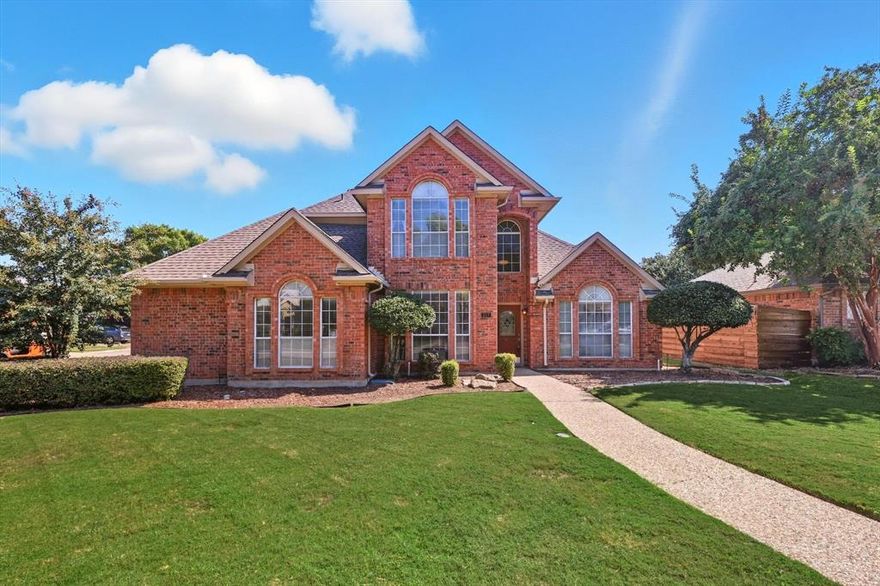 If being able to walk to Coppell’s largest park, Andy Brown Park, TheCORE Rec Center, Kid Country Park, the library, and top-rated Coppell ISD schools is on your wish list, this is the one! This 4-bedroom, 3-bath home sits on a desirable corner lot just steps from Andy Brown Park, where you can enjoy miles of scenic trails, sand volleyball, basketball and soccer fields, playgrounds, and more. You’ll also love being within walking distance to some of Coppell’s biggest annual events like the 4th of July fireworks show and Christmas Tree Lighting. Inside, you’re welcomed by a formal living and dining room off the foyer. The family room features a cozy fireplace and a wall of windows overlooking the backyard. The kitchen offers stainless steel appliances, a breakfast nook, and nearby laundry room. The first-floor primary suite is privately situated on its own wing and features a double-sink vanity and large walk-in shower. An additional full bathroom downstairs is perfect for guests. Upstairs are three spacious secondary bedrooms and a full bath. Out back, you’ll find a patio and a good-sized yard with plenty of space to enjoy. A two-car garage completes this fantastic home in one of Coppell’s most sought-after locations.