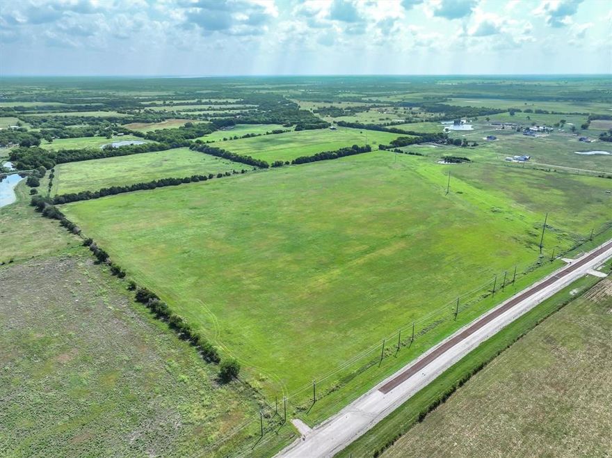 Rare opportunity to own 11.28 (+ or -)  acre lot to build out your forever ranchette.  There are 4 to choose from and located in the Poetry area which has developed into a sought after community half way between I 30 and I 20 convienent for commuters or trips to the airport.  These lots were thought out and divided with care to include a house and 1 acre plus 10 for an agricultural use if desired.   The property is currently under hay production.  The sellers have already surveyed out 4 large lots to choose from and water, electric are available at the road for each lot. We have included a virtual example of what your vision might look like on lots 1-4.  Now is the time to make it yours, call for more information.  Septic required for each lot bring your builder take a look!  Photos with homes and buildings have been virtually displayed and do not exist to easier visualize the properties possibilities.