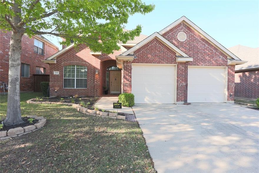 This Euless home is in a gated community moments from DFW Airport with community ponds, walking trails, and parks.  It’s been well cared for and is move in ready.  Inside, you’ve got a spacious family room with a cozy corner fireplace and is open to the kitchen and dining area.  The 2nd  living area is upstairs. The layout is simple and functional with three bedrooms downstairs and one upstairs, plus three full bathrooms. The split floor bedroom arrangement is perfect for a multigenerational family or quests with extra privacy.
The kitchen features an island cooktop, wood cabinets, and Corian countertops, making it a great spot to cook and gather.
Out back, there’s a nice entertaining area with an 8 foot privacy fence, and grassy yard for pets to roam.
Built by Sandlin Homes, this is a comfortable, easy living home in a great location.
Sellers require proof of funds or letter of prequalification with offers.