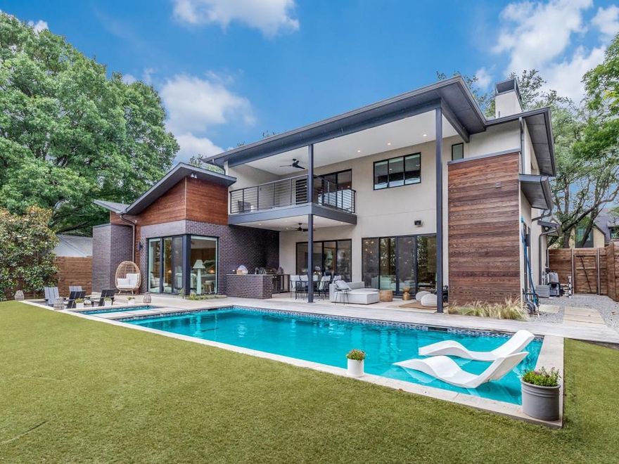 Exceptional Lakewood Living.  Just Steps from White Rock Lake!

Discover this one-of-a-kind custom home nestled on an oversized lot in the heart of Lakewood, surrounded by estate homes and just a short stroll from walking and biking paths, White Rock Lake, and quiet Dominique Park. This thoughtfully designed residence is filled with beautiful natural light and offers the perfect blend of luxury, comfort, and functionality for adults and kids alike.

The open-concept floor plan features elegant finishes and a climate-controlled wine cellar, ideal for entertaining. The spacious downstairs primary suite provides a peaceful retreat, with a corner glass window looking onto your backyard oasis and entertainment area.  A second bedroom on the main floor is perfect for a nursery, guests or multi-generational living. Upstairs, you'll find three additional bedrooms, a generous game room area, and another versatile flex space ideal for a home office, gym, bedroom or creative studio.

Step outside to your private, turfed backyard with mature Magnolia trees for added privacy, a stunning pool and spa, outdoor kitchen, and sunken lounge area with fire pit. An outdoor bathroom adds convenience for poolside gatherings.  On the second floor, just off the second living room, you'll find an oversized covered patio, also overlooking the entire backyard entertaining area.

Architectural details shine throughout with a striking blend of hand-troweled stucco, iron spot brick, and rich Douglas fir accents delivering a warm, modern aesthetic inside and out.  So many extras to see!

This home offers a rare opportunity to live, work, and entertain in one of Dallas’ most sought-after neighborhoods, with nature right outside your door.

Measurements and room sizes are approximate.  Buyer and Buyer's Agent to verify all information provided in this listing.
