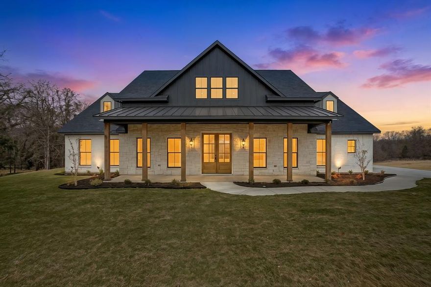 Tucked away on 6 private, tree-lined acres, this brand-new custom home offers a rare opportunity for acreage, privacy, and luxury living. As you wind down the long driveway, the home sits set back from the road, creating a peaceful and private retreat.
Built on a pier-and-beam post-tension concrete foundation with 3500 PSI concrete, this home was designed for durability and long-term performance. The well-planned layout features 4 bedrooms, 3 full bathrooms, and a dedicated office on the main level, along with an oversized garage ideal for trucks, storage, or hobbies.
The chef’s kitchen showcases quartz countertops, all-wood custom cabinetry, a pot filler, gas appliances, double ovens, and a Whirlpool appliance package—perfect for everyday living and entertaining. A spacious laundry room with a farmhouse sink adds convenience and charm.
Upstairs, a 630± sq ft bonus room with a full bath offers flexibility as a fifth bedroom, guest suite, media room, or gym.
Energy-efficient features include two TRANE 18 SEER multi-stage heat pump systems, foam insulation, and a tankless gas water heater. Additional highlights include hardwood floors, propane installed, water softener prep, sod, irrigation, and professional landscaping.
Additional acreage available—contact listing agent.