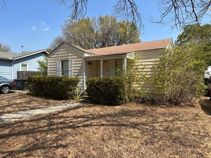 2 Bedroom Residence with a Spacious Detached Garage in a Well-Established Neighborhood! Detached garage offers ample storage space. A stately tree graces the front yard, enhancing curb appeal. Perfect investment opportunity or home to make your own. Call with questions!