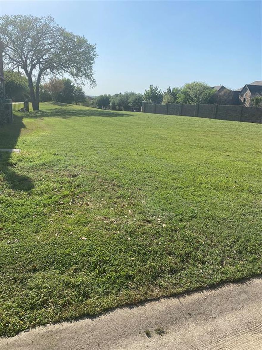 This Lot is located in the exclusive private and secure with 24-7 guard community of The Resort On Eagle Mountain Lake.  Community Amenities include  18 hole golf course, club house bar and grill, fitness center, playground, 2 swimming pools, pickle ball court, basketball court, corn hole, picnic tables, boat slips, ramp to lake, .  This Lot is located on the 9th hole and is the last golf Lot. A corner Lot that you can bring your builder and build your dream home. New Survey .20 acres.