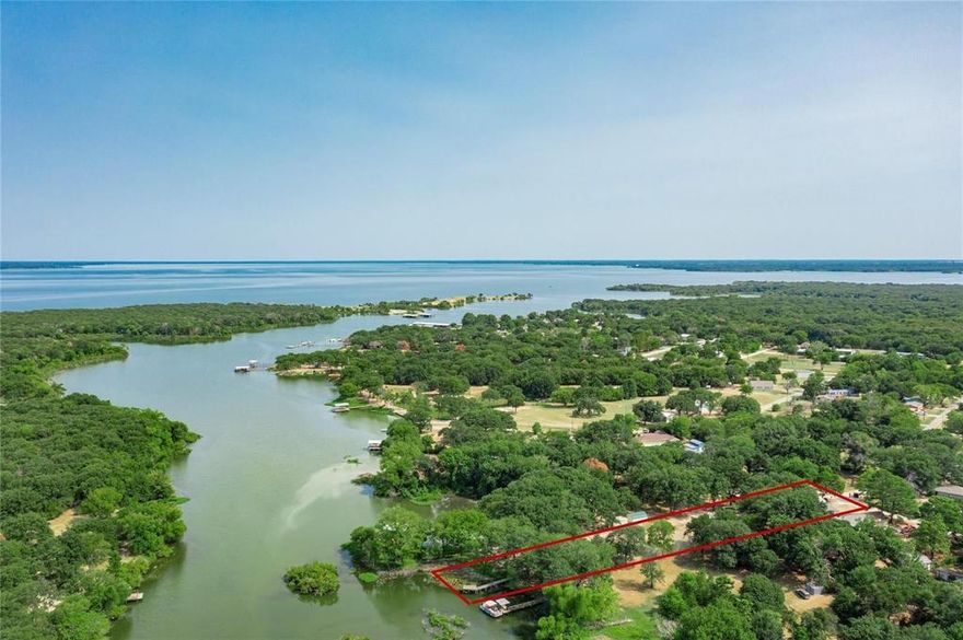 Experience the perfect blend of modern comfort and lakeside tranquility with this custom-remodeled home on scenic Lake Tawakoni. Ideal for waterfront enthusiasts seeking peace and privacy without sacrificing convenience—just an hour from Dallas.

Every detail of this home reflects quality and care. The roof was replaced in December 2022, and recent updates include new fixtures, interior paint, appliances, granite countertops, doors, and an exterior deck off the primary suite—plus much more.

The open-concept floor plan maximizes space and flow, while large windows fill the interior with abundant natural light. The expansive kitchen, featuring an oversized island, is ideal for entertaining family and friends.

A converted garage offers the potential for a detached mother-in-law suite, guest quarters, or custom workshop. The property also includes approximately half an acre of additional SRA land—providing ample room for children, pets, and outdoor activities.

With a private pier already in place, you can start enjoying Lake Tawakoni’s renowned fishing right away. Don’t miss your opportunity to own this exceptional waterfront retreat—schedule your private tour today!