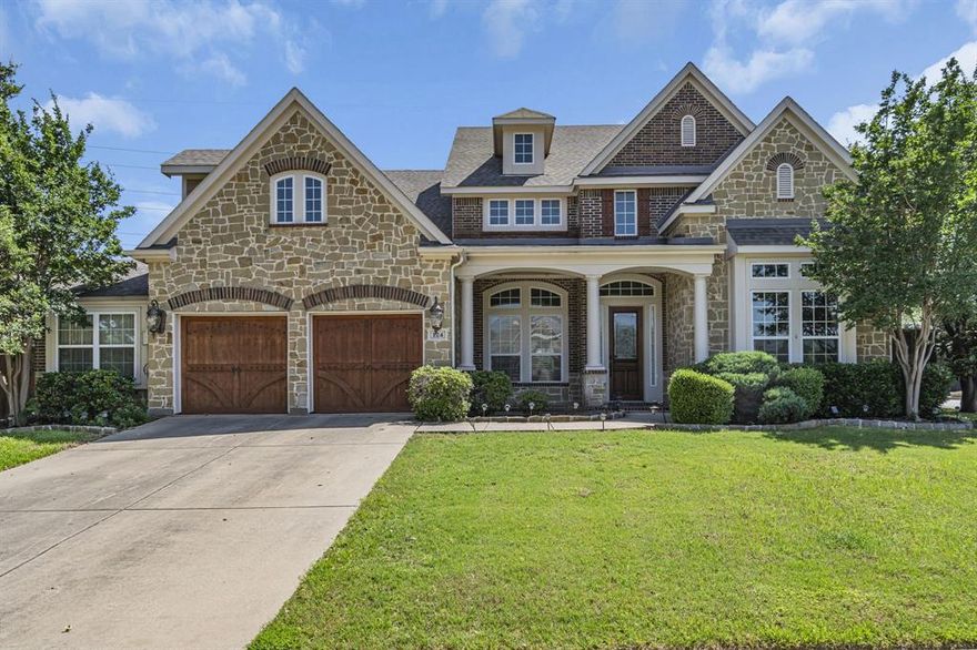 Beautiful large David Weekley home in desirable Silver Lakes Estates. This home is the model plan & has every sf option that could be added including, bonus room over garage, super utility, media room & 5th bedroom. Upgraded curb appeal plus thoughtful design throughout make this a perfect home. The large bright living room features a fireplace with custom wood mantle to the second floor. The living area flows to the kitchen featuring granite, SS appliances including a warming drawer. The dedicated private office features French doors with a transom, floor to ceiling custom bookshelves & woodwork. Upstairs has many options with 3 bedrooms, a media room and a oversized bonus room with built in seating and storage. Exemplary Grapevine Colleyville ISD schools. Fantastic location located within walking distance to historic downtown and lake Grapevine. Ease of access to shopping, dining, DFW airport.