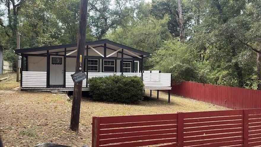 This  Small cottage  Tucked Beneath a canopy of towering trees offers a serene lifestyle , perfectly at peace among the woods and just  Steps Away from Lake Palestine.

Owner did not finish out  so come with your Ideas and make this your own  to live in, or maybe and  Airbnb, Enjoy Morning Coffee in the Wrap arounf Porch Here where the World Slows Down and the quiet beauty of country Living Awaits you