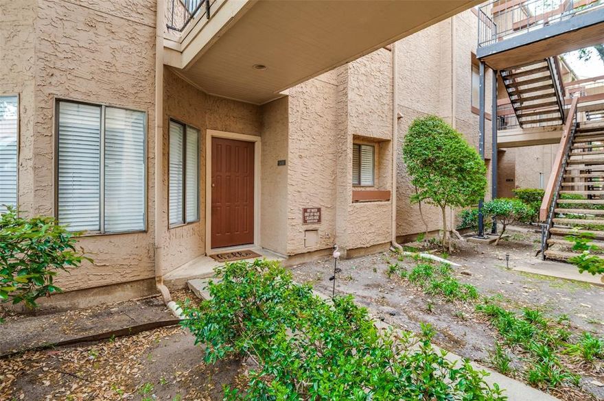 Welcome to 5550 Spring Valley Rd, Unit G16 - an updated 1-bedroom, 1-bath condo offering comfort, convenience, and easy ground-level access.  Enjoy the rare benefit of direct entry from the parking lot through your private back door, making daily living effortless. Inside, fresh paint and stylish plank flooring create a clean, modern feel throughout. The kitchen features granite countertops, a new stove and microwave, and includes a stackable washer and dryer that will remain with the home.  The bathroom has been thoughtfully updated with a luxurious walk-in shower, adding a spa-like touch to your daily routine.  The community offers a beautifully maintained pool, perfect for relaxing or entertaining. Ideally located near major highways including 635 and the Dallas North Tollway, it offers convenient access to shopping, dining, and everyday essentials.  Perfect for first-time buyers, downsizers, or investors, this move-in ready condo combines low-maintenance living with a highly desirable location.