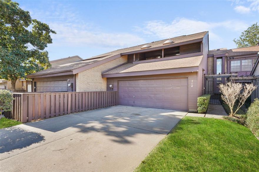 Spacious & Updated Townhome in Woodhaven Country Club Estates! This bright and airy 2-story townhome features one of the largest floorplans in the community with 2,339 square feet of comfortable living space. Ideally located with quick access to I-30 and I-820, you’re just minutes from Downtown Fort Worth, Arlington, and TCU, making commuting and daily errands effortless. The thoughtfully updated interior offers fresh paint throughout, new carpet, neutral tones, and updated bathrooms and showers. The kitchen includes updated appliances, and the living area impresses with soaring ceilings and a wall of windows overlooking the peaceful backyard patio and greenbelt beyond—no mowing required. Touches of character and style shine through with brick accent walls, blending classic charm with modern appeal. The spacious primary suite features a private balcony, perfect for morning coffee or evening relaxation, along with a custom feature wall that adds a modern touch. Additional balconies provide tranquil views throughout the home. Enjoy low maintenance living in this smaller, well-maintained HOA community with mature trees and a sparkling pool just steps from the front door. HOA dues include water, sewer, trash, roof, exterior maintenance, and front & back yard care, offering exceptional value. Major upgrades include a new AC installed in 2021. Refrigerators, washer & dryer, and TVs will convey. Move-in ready with room to add your own personal flair—this home offers incredible potential in a prime location. Don’t miss the opportunity to make it yours—schedule a showing today!