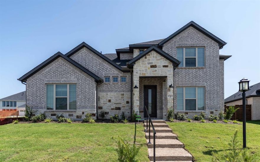 Gorgeous home in Solterra, Texas by CastleRock. The Hagen floor plan includes four bedrooms, three full bathrooms, and an upstairs game room!